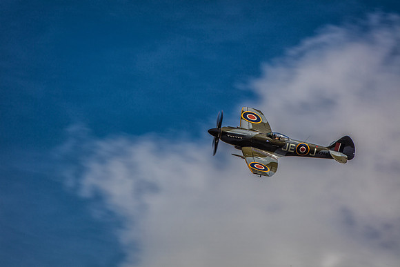 Clip wing spitfire into the clouds
